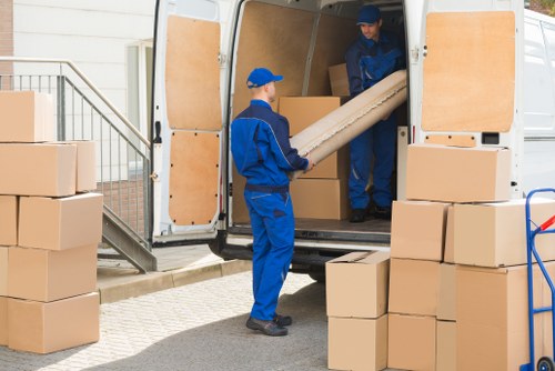 Student removal van and boxes prepared for a move in Belsize Park