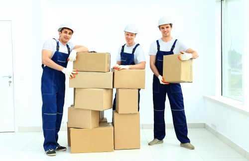 Professional Belsize Park removals team discussing careful transport and service standards