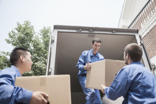 Moving boxes, tape, and protective packing materials ready for use