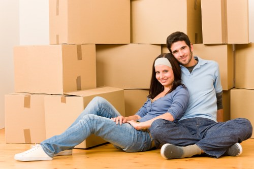 Careful handling of furniture during a flat move in Belsize Park