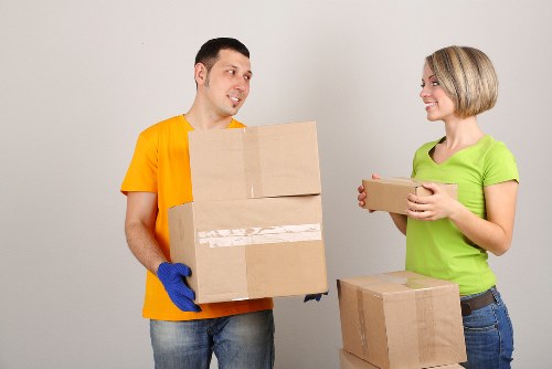 Furniture being moved from a Belsize Park flat with stair access