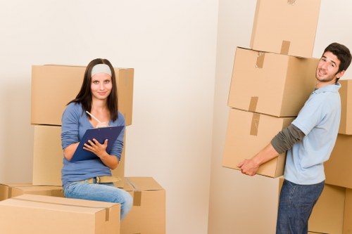 Local movers handling fragile items for a home relocation